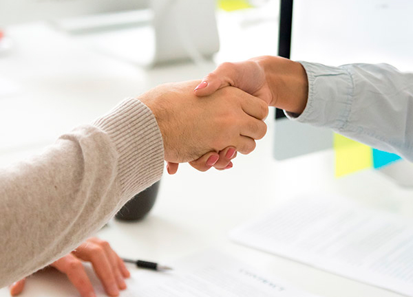 two people shaking hand