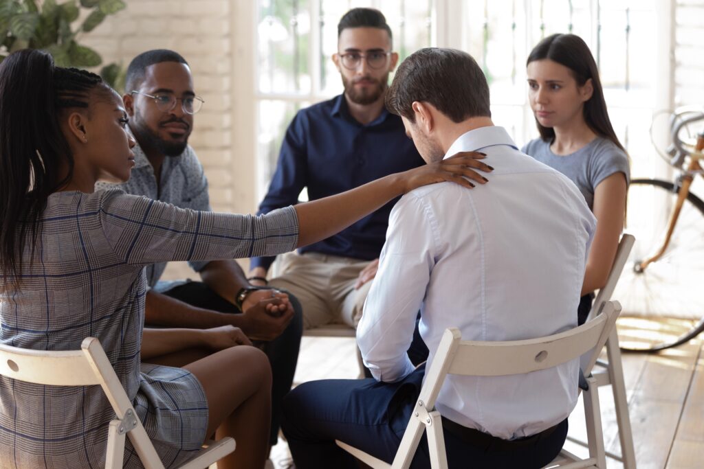 Support group socializing with each other their problems with addiction